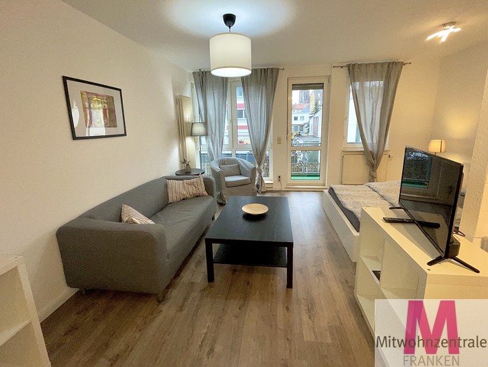 Helle und schön möblierte 1-Zimmer-Wohnung mit einem kleinen Balkon - Foto 1