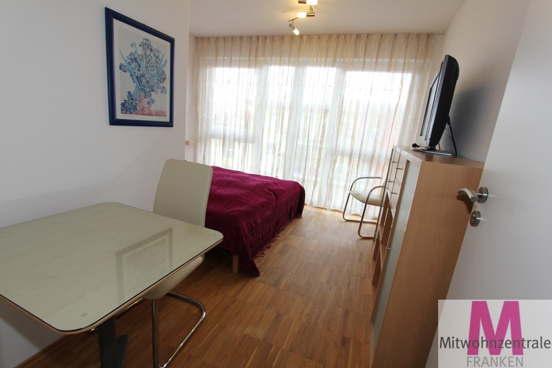 Lichtdurchflutete und schicke Maisonettewohnung mit Blick auf den Südstadtpark - Foto 1
